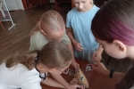 увеличить