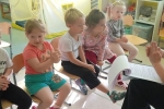 увеличить